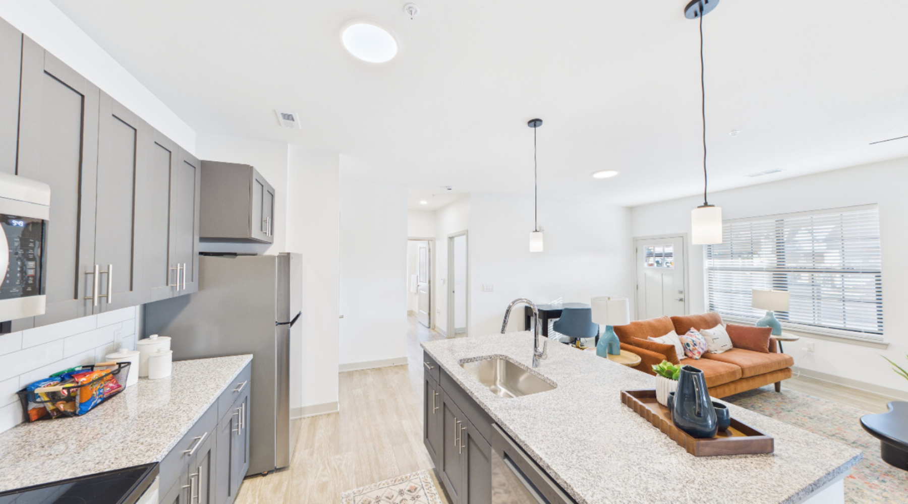 Styled kitchen with gray cabinets